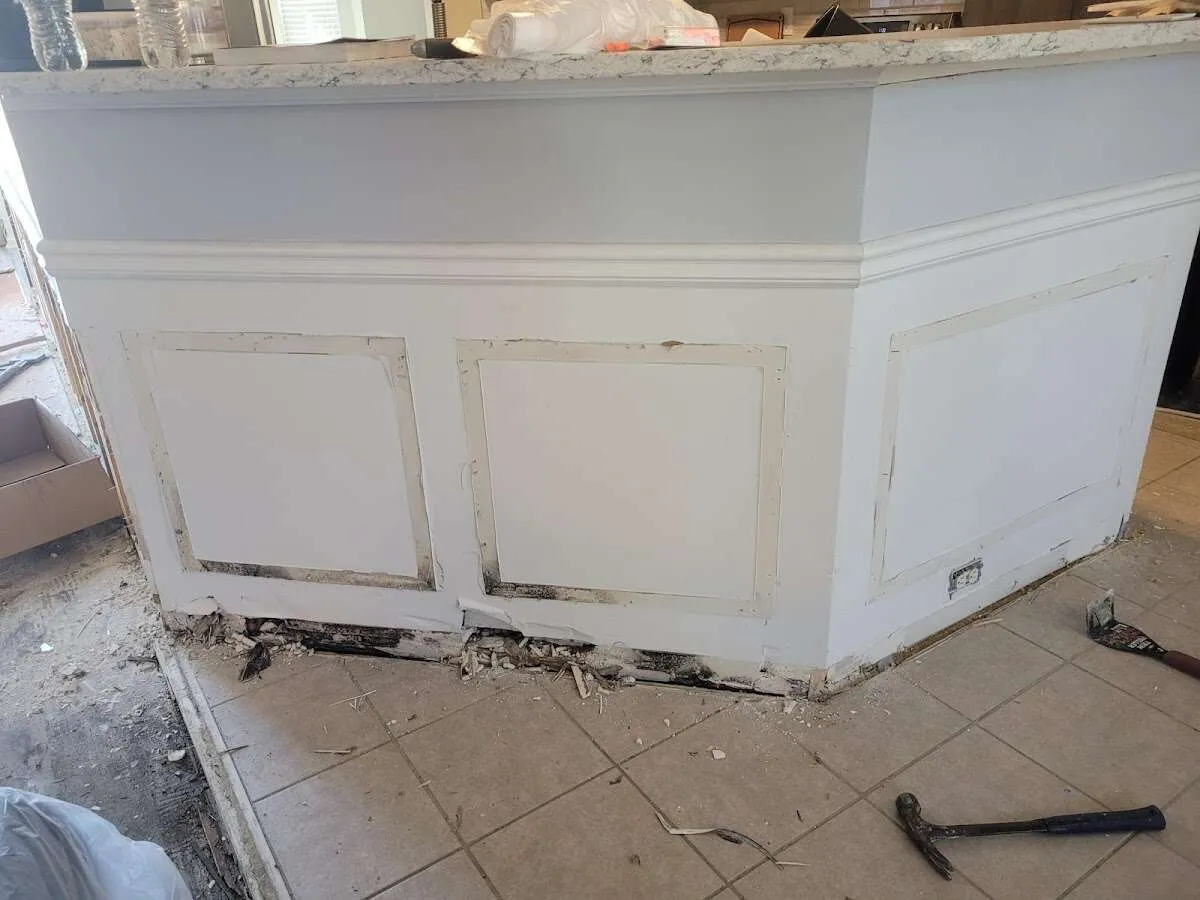 Water damage and mold on kitchen during Storm Damage Restoration in Redding